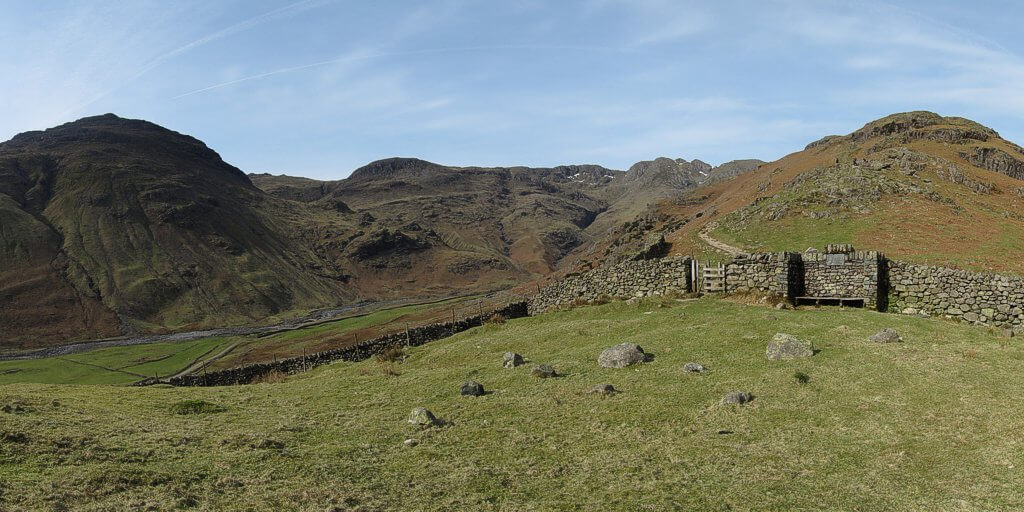 At the western end of Great Langdale, a bath winds up the Band to Bow Fell (902m), Lake District, English Mountains.