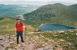 Ascent of Caher with Lough Coomloughra below. Coomloughra Horseshoe, Ireland. Ascent of Caher with Lough Coomloughra below. Coomloughra Horseshoe, Ireland.